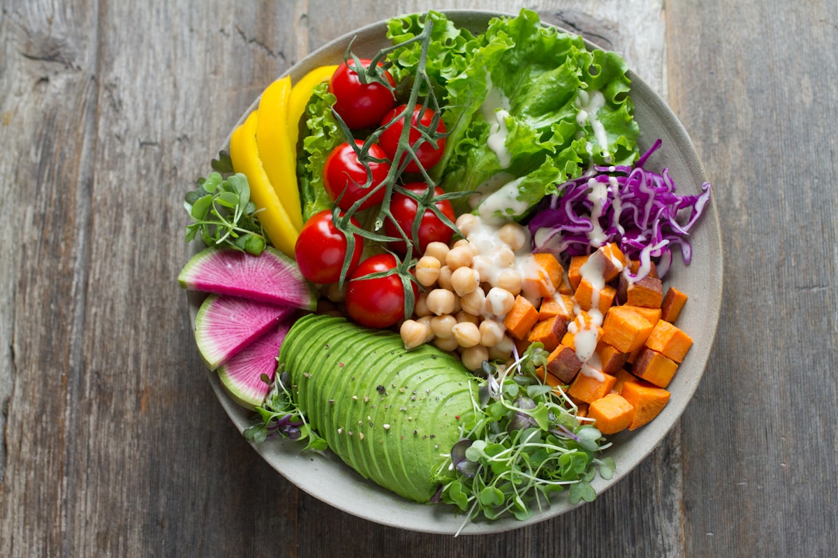 Colorful balanced meal bowl with vegetables grains and protein